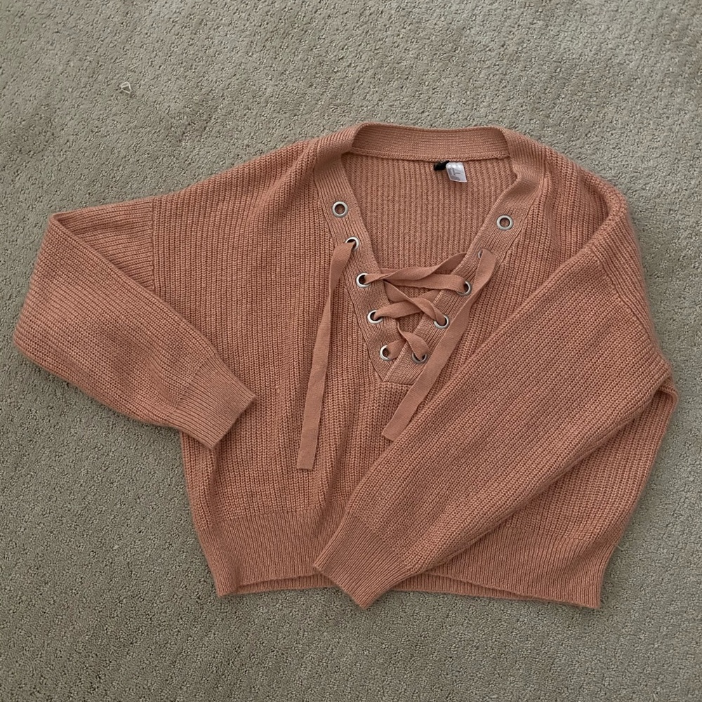 Dusty pink cropped lace up sweater